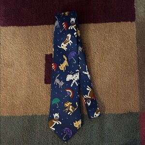 Save The Children Necktie Titled “RAINING PETS”